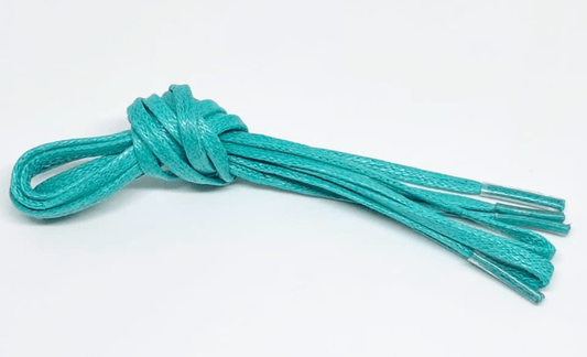 Thin waxed flat lagoon green laces