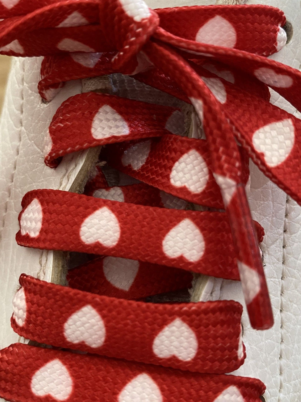 Red laces white hearts
