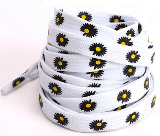 White flat laces with black daisies