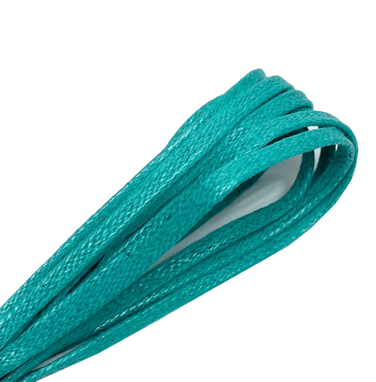 Thin waxed flat lagoon green laces