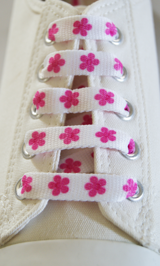 White laces with pink/fuchsia flowers