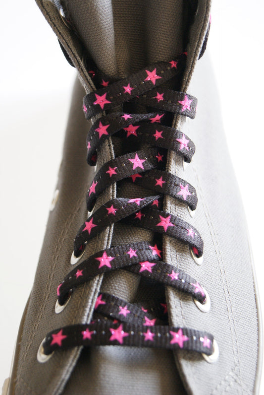 Black laces and neon pink stars