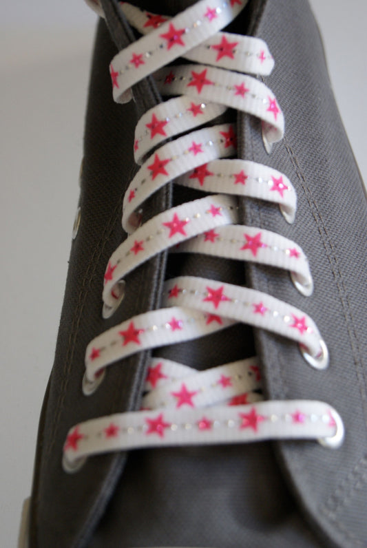 White laces and neon pink stars