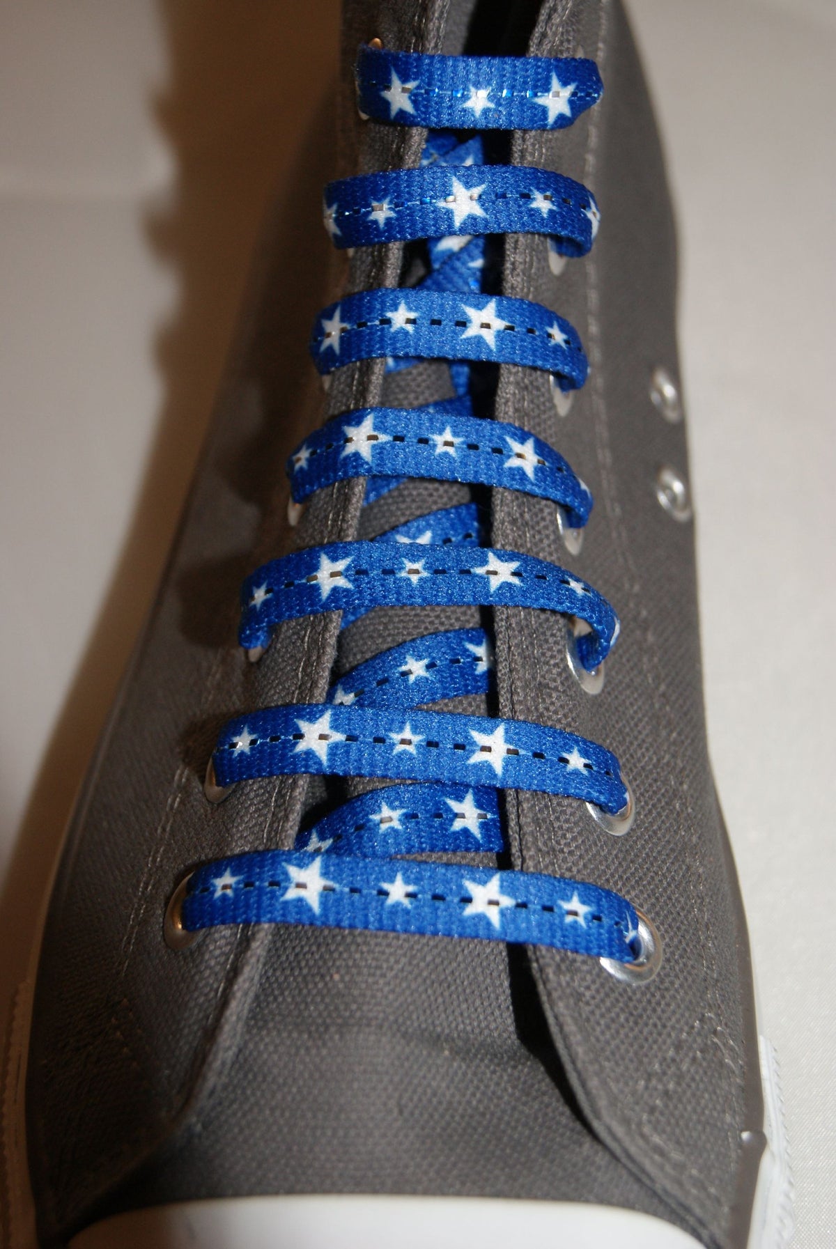 Royal blue laces and white stars