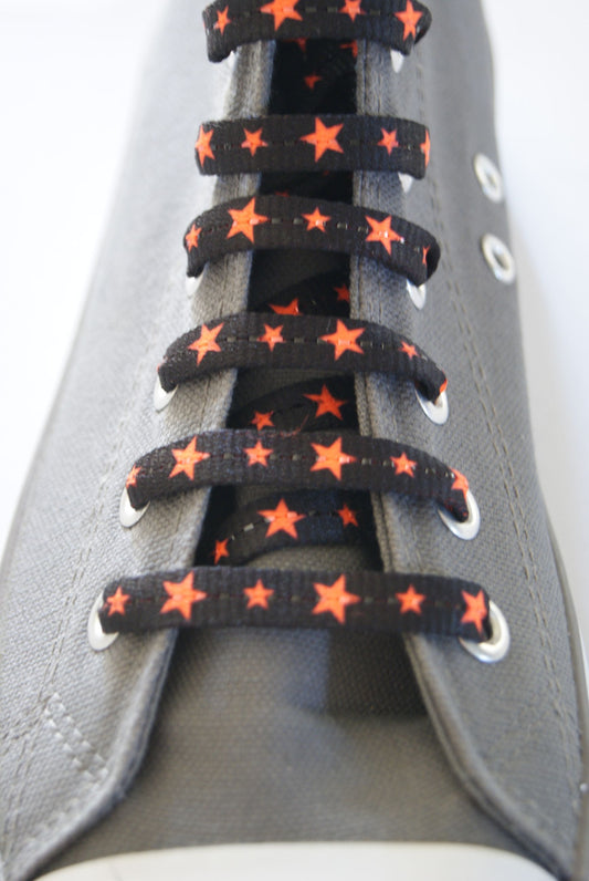 Black laces and neon orange stars