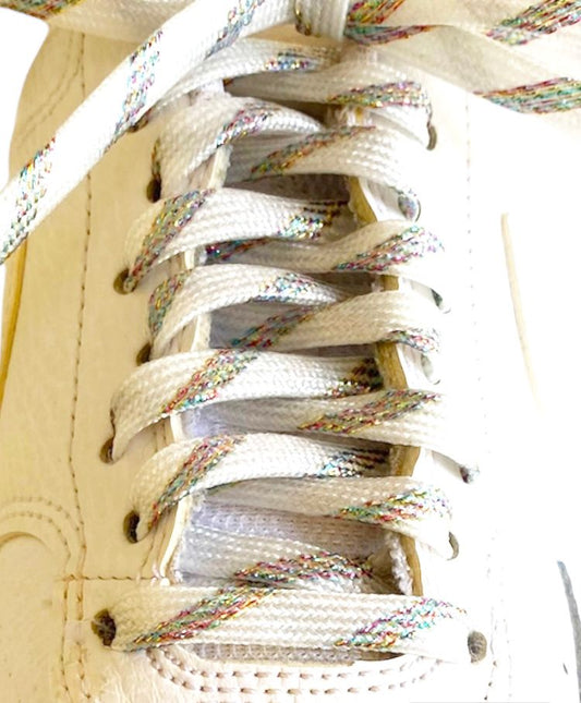 Thin white glitter laces with pink multicolored sparkles.