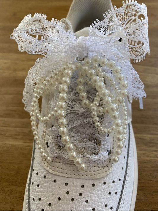 Bijoux Pompon perles de culture pour lacets