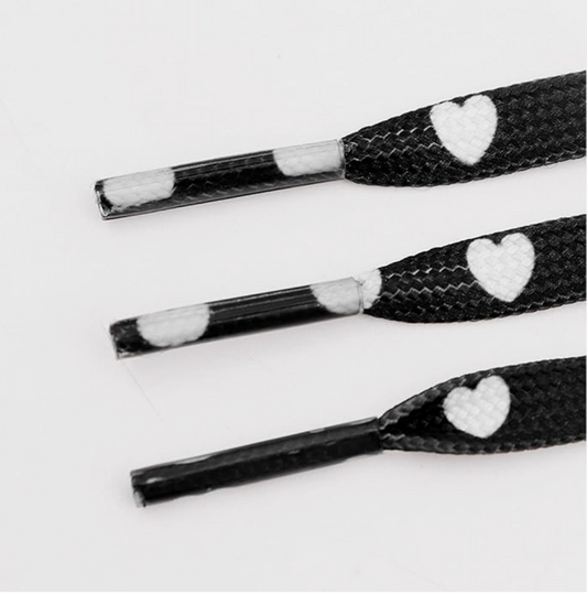Black fancy flat shoelaces with white hearts
