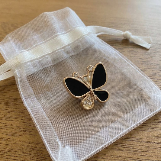 Bijou à lacets clips Papillon noir et doré à petits strass